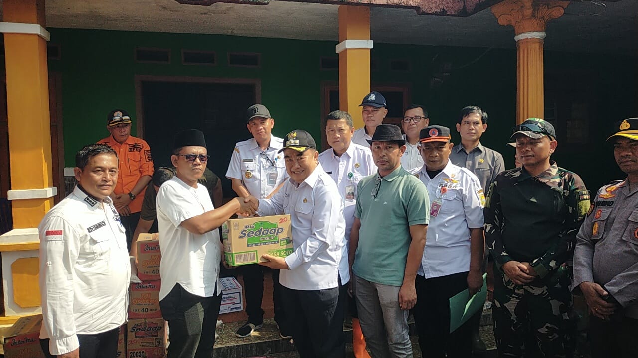 Bupati Tanggamus Tinjau Lokasi Banjir dan Berikan Bantuan