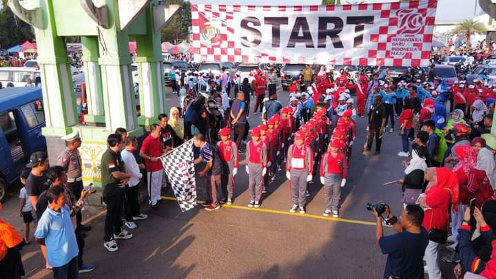 Pj. Bupati Lampung Utara Buka Lomba Gerak Jalan Tingkat SD/MI Tahun 2024