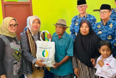 Bupati Lamtim Dampingi Penyerahan Bantuan Pangan IPKP untuk 534 KK di Desa Pakuan Aji
